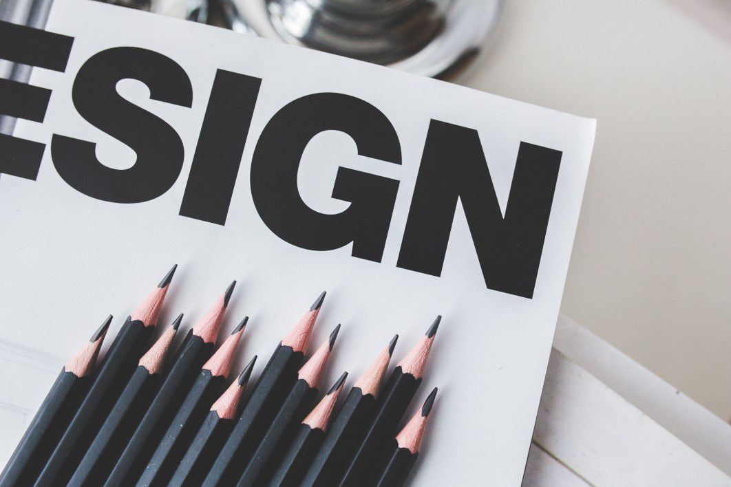 Black Pencils and Design Sign