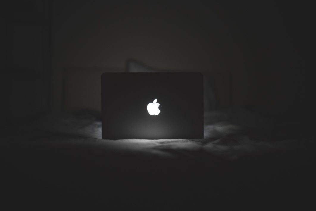 B&W MacBook Glowing Apple Logo