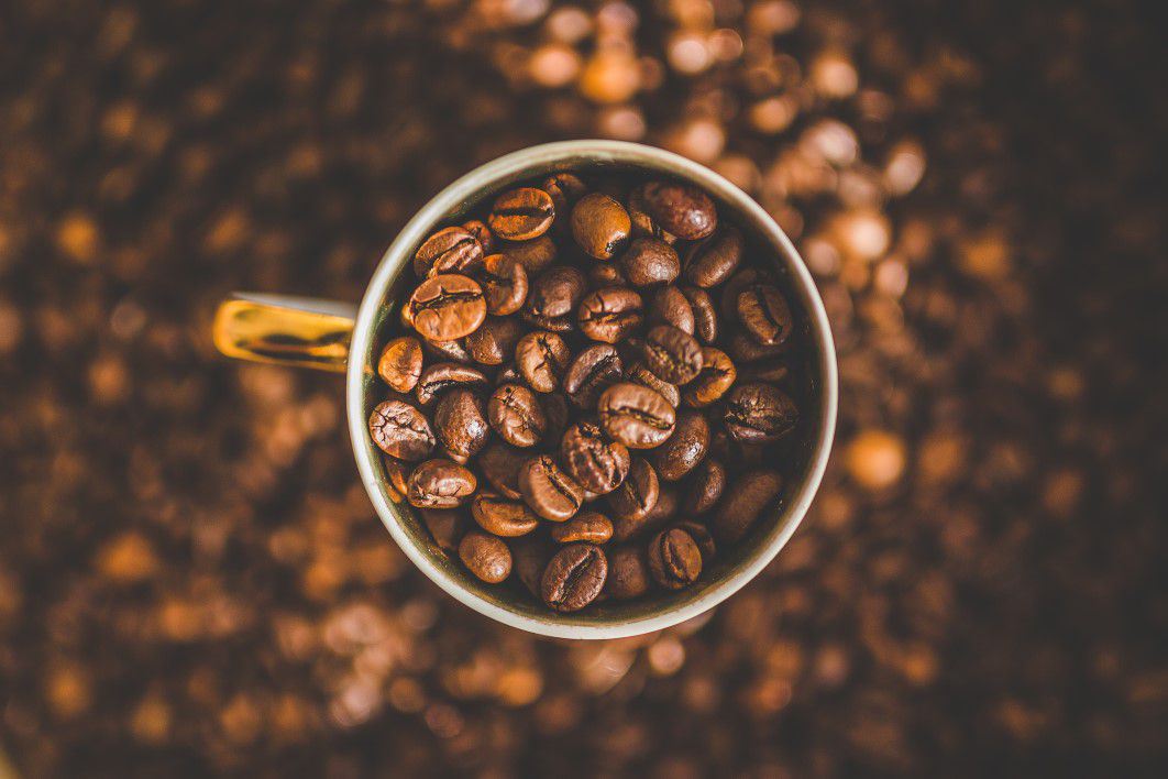 Cup Full of Coffee Beans