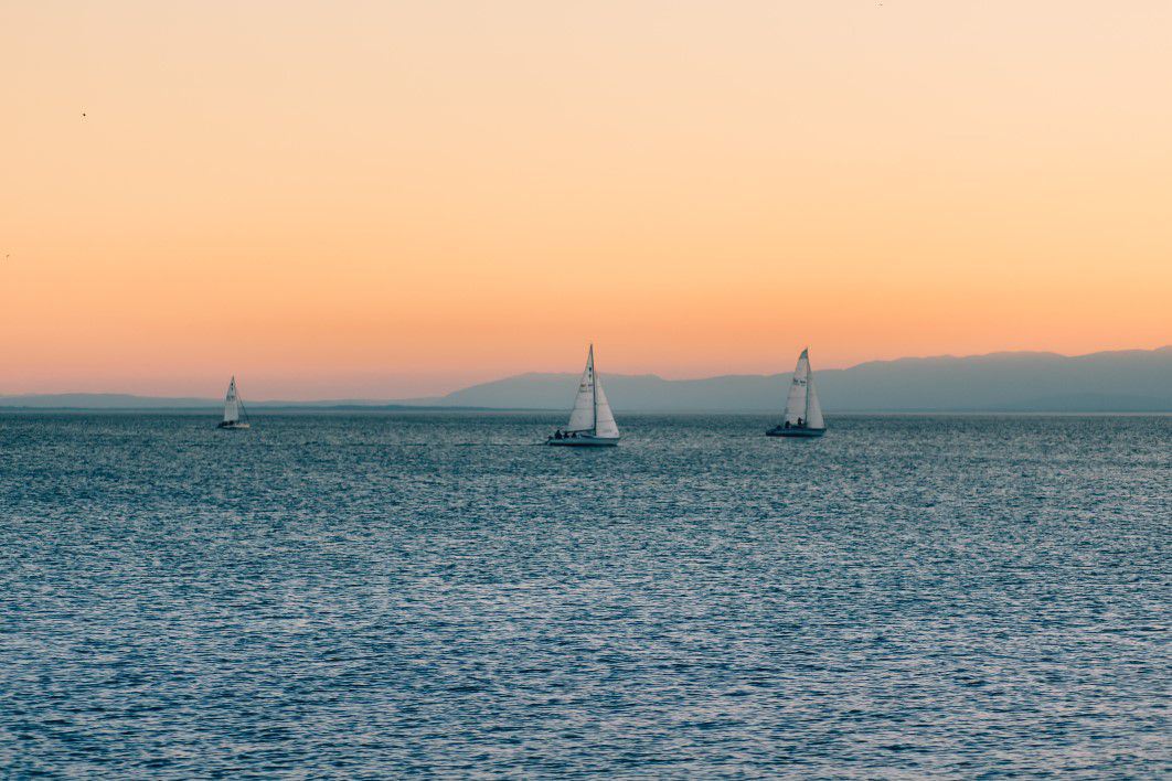 Sailboats on Water Sunset