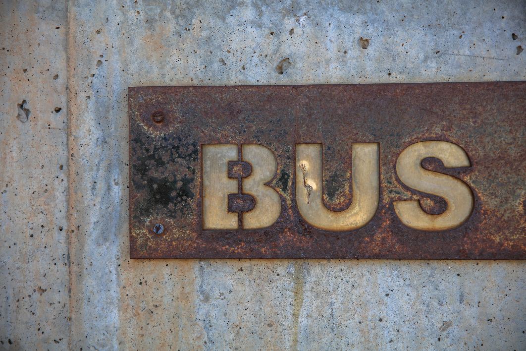 Rusty Bus Sign Wall