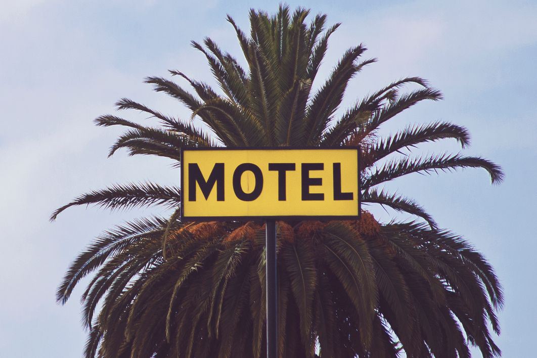 Motel Sign Palm Trees