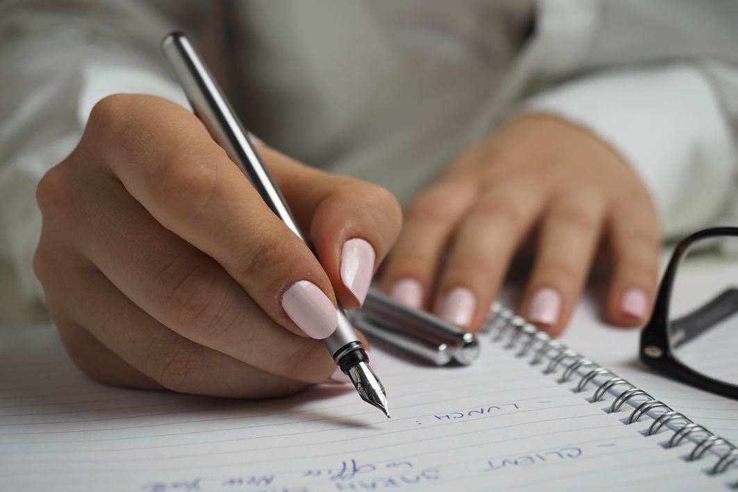 Woman Writing Notepad