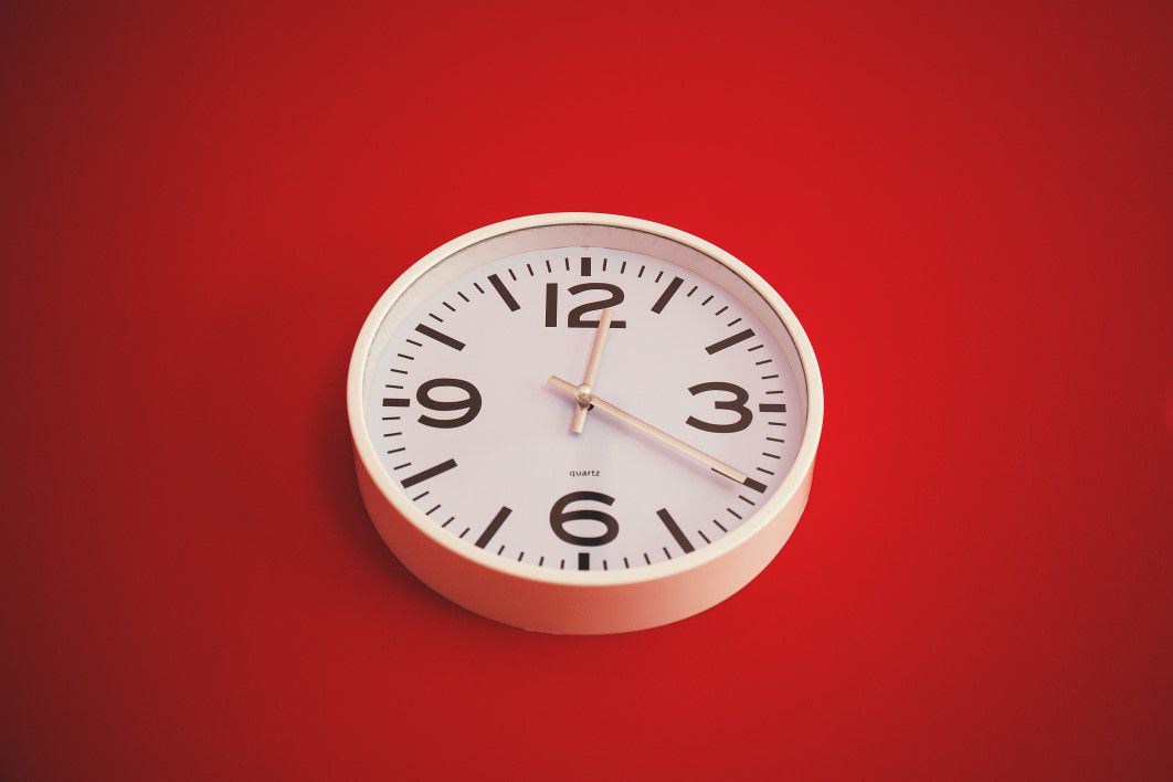 White Wall Clock Red Background