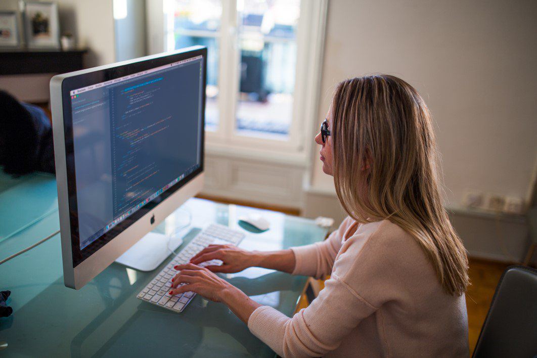 Woman Office Worker on Mac