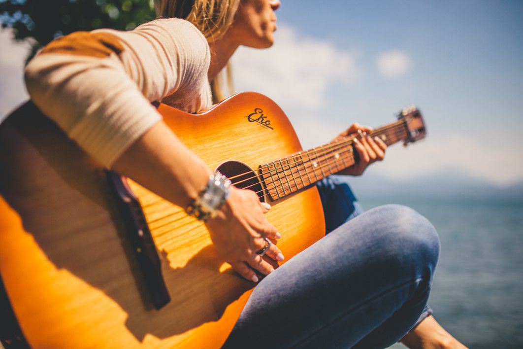 Woman Playing Guitar