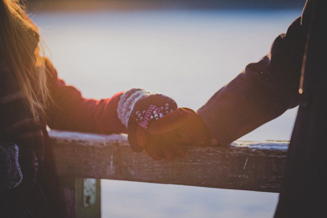 Young Adults Holding Hands