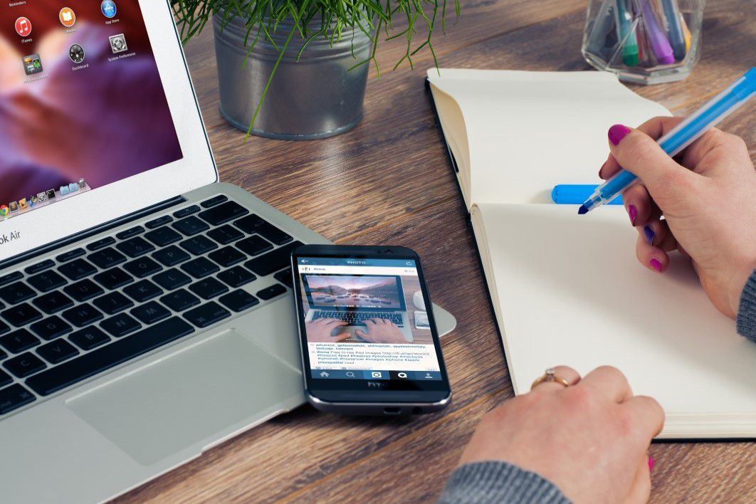 MacBook Air, iPhone & Notepad