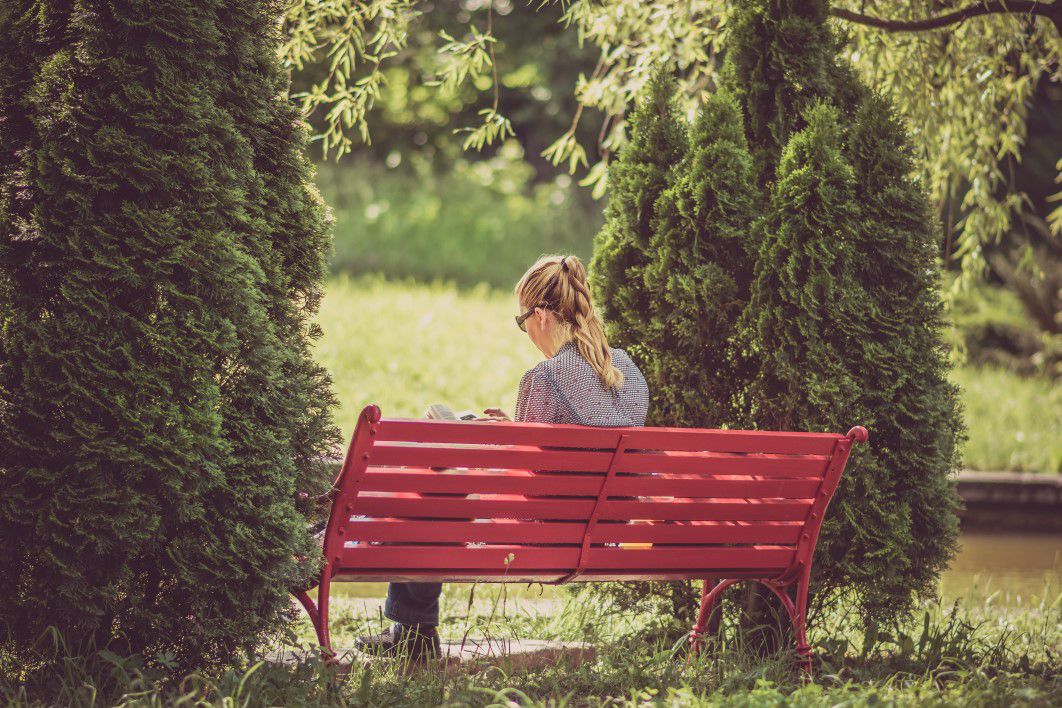 Woman Reading Red Park Bench