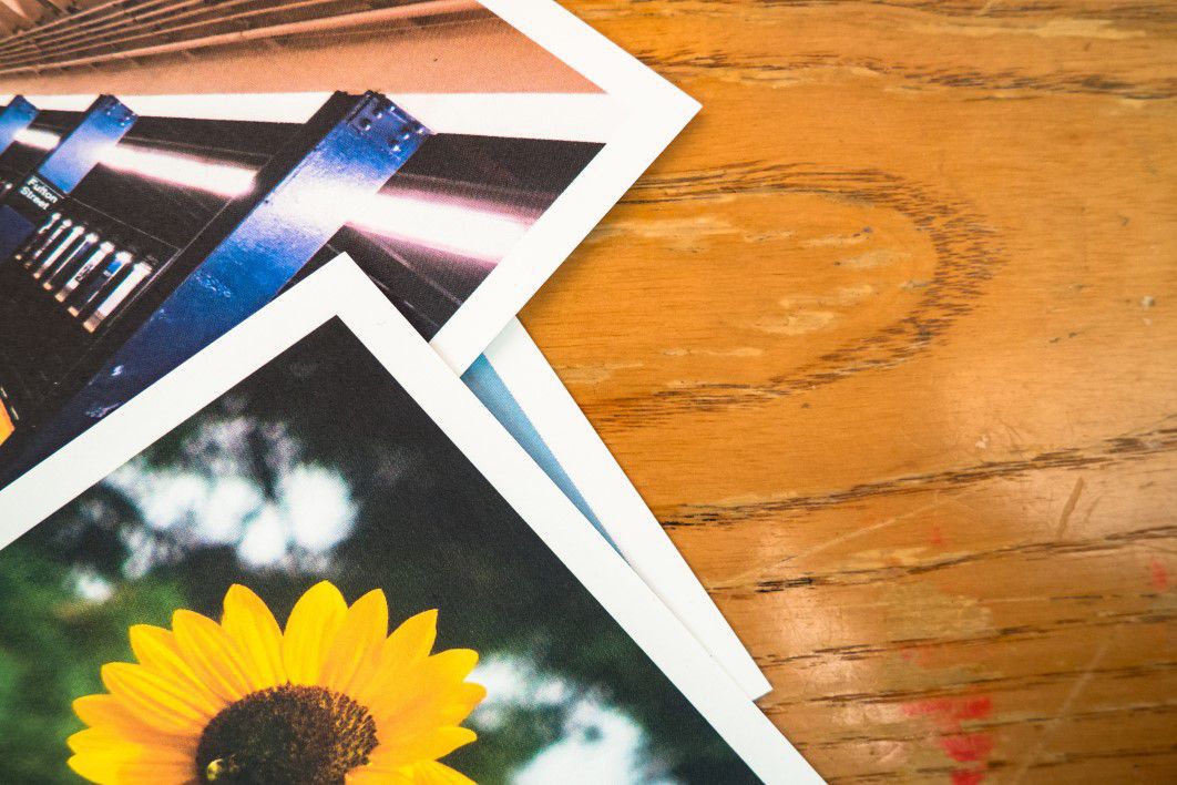 Stack Photos Polaroid Wood Desk