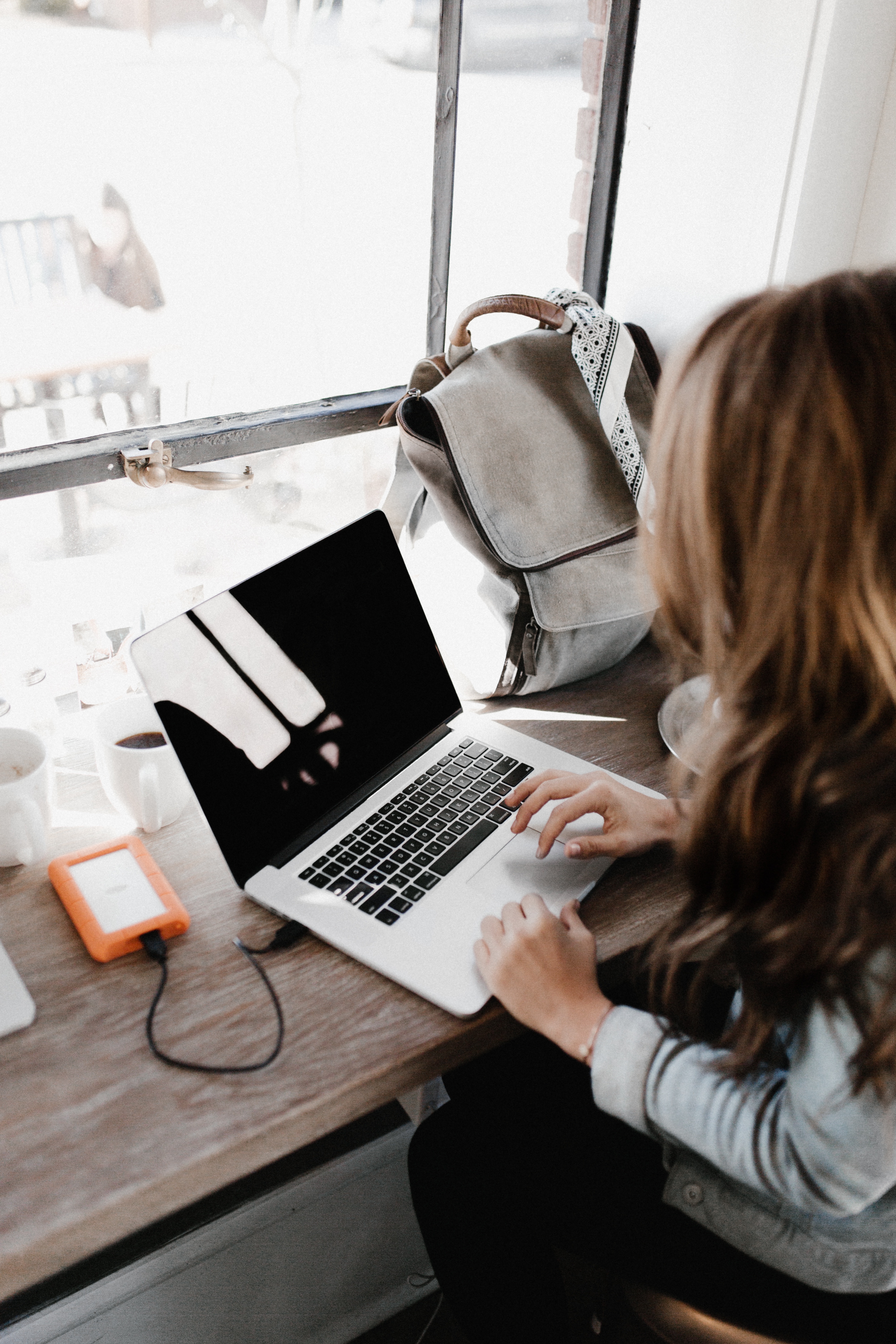 Woman Satchel MacBook Working