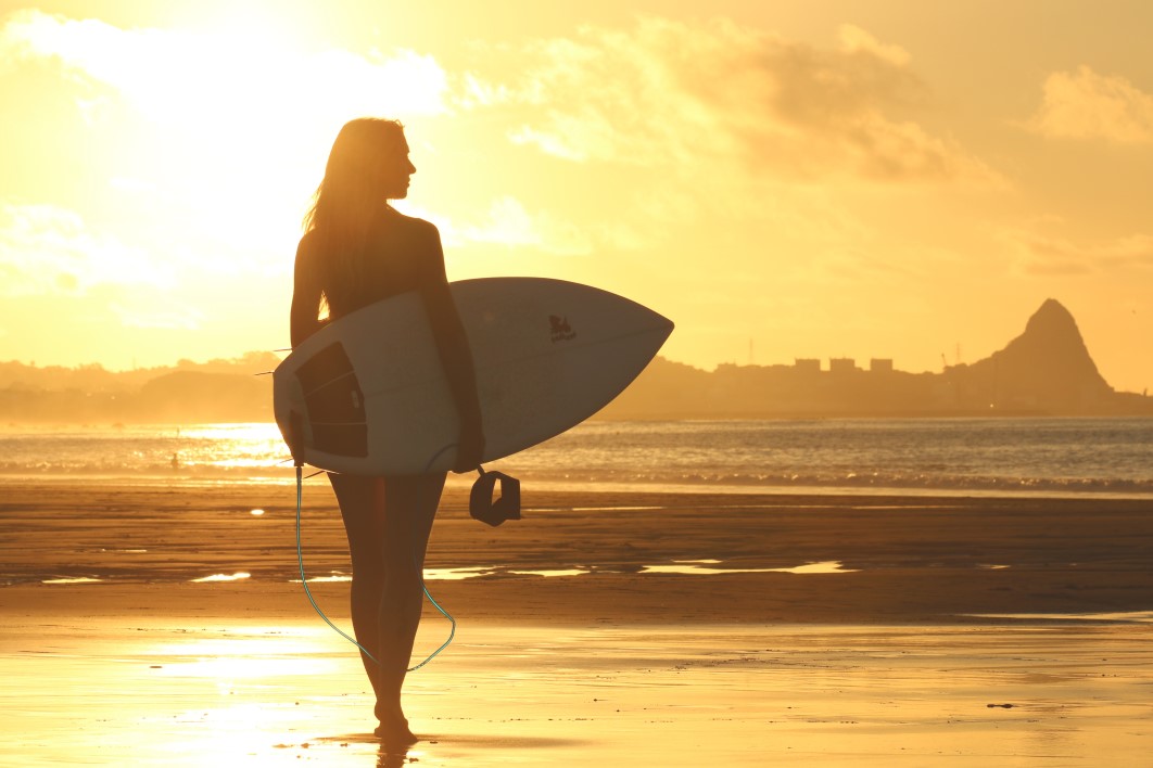 Woman Surfboard Beach Sunset