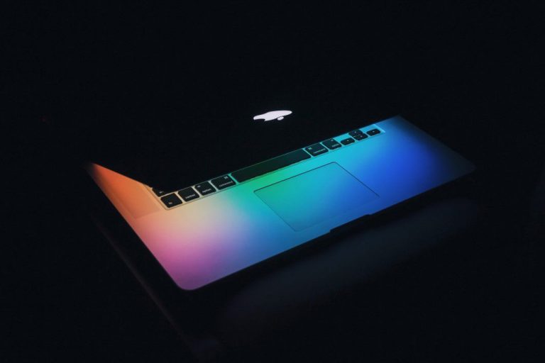 MacBook Illuminated Dark Royalty Free Photo