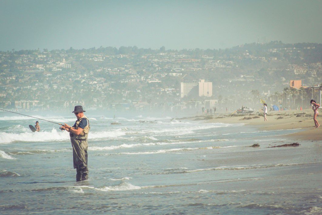 Man Fishing Fisherman Hat Beach Waves Sea
