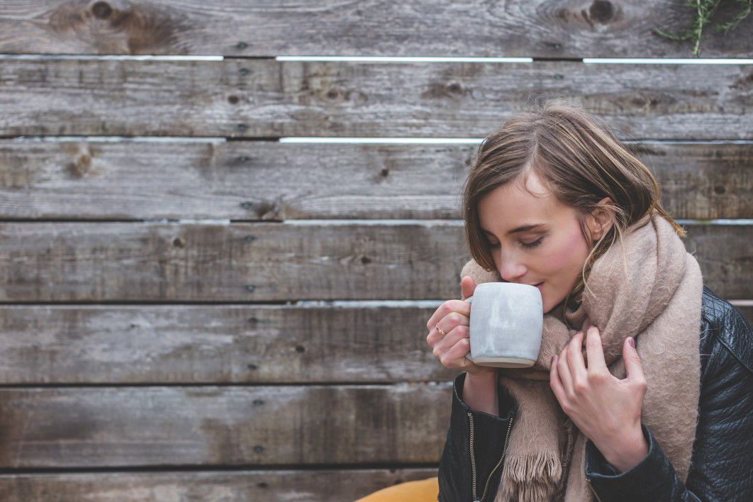 Woman Drinking Hot Coffee