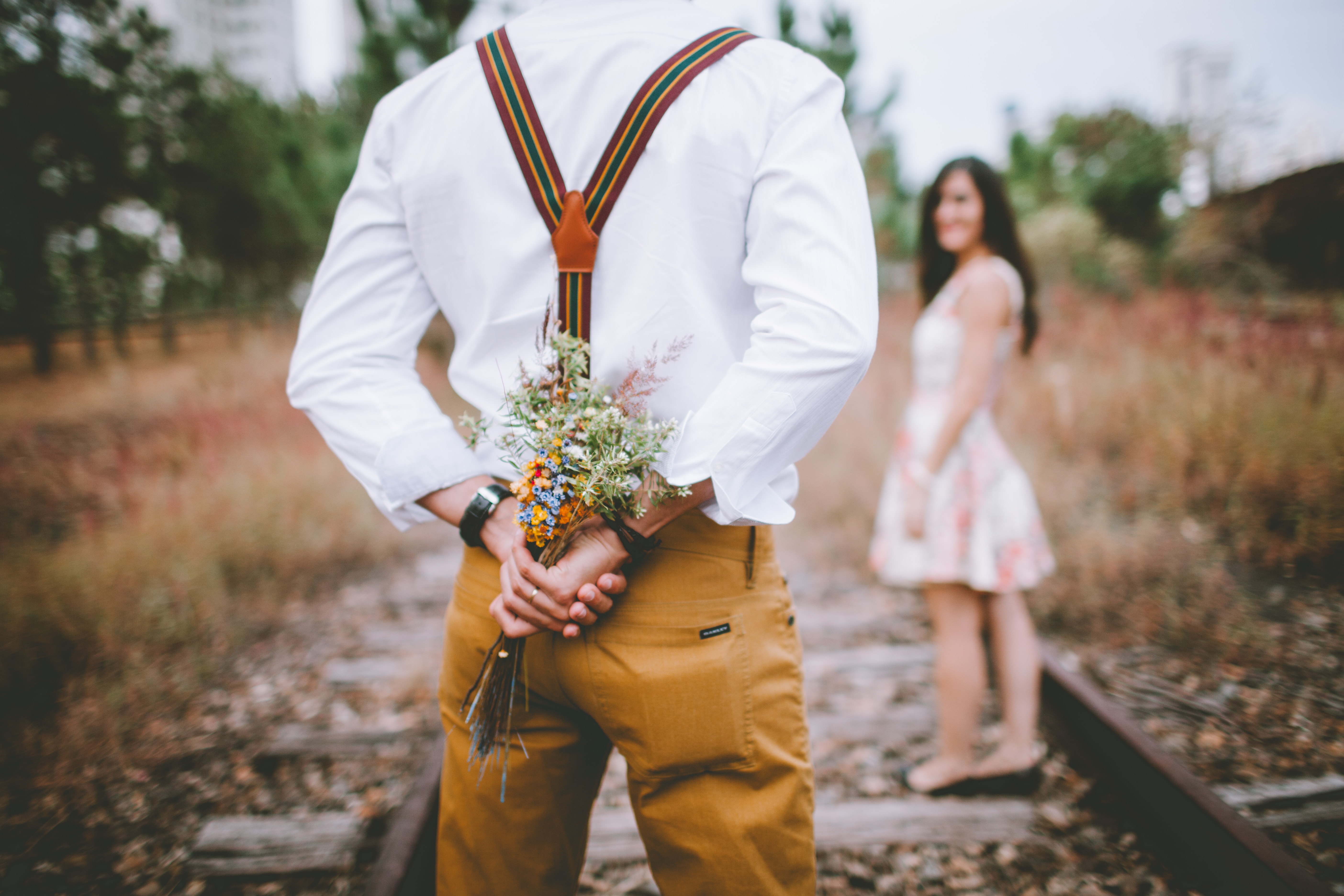 Man Woman Flowers Railway