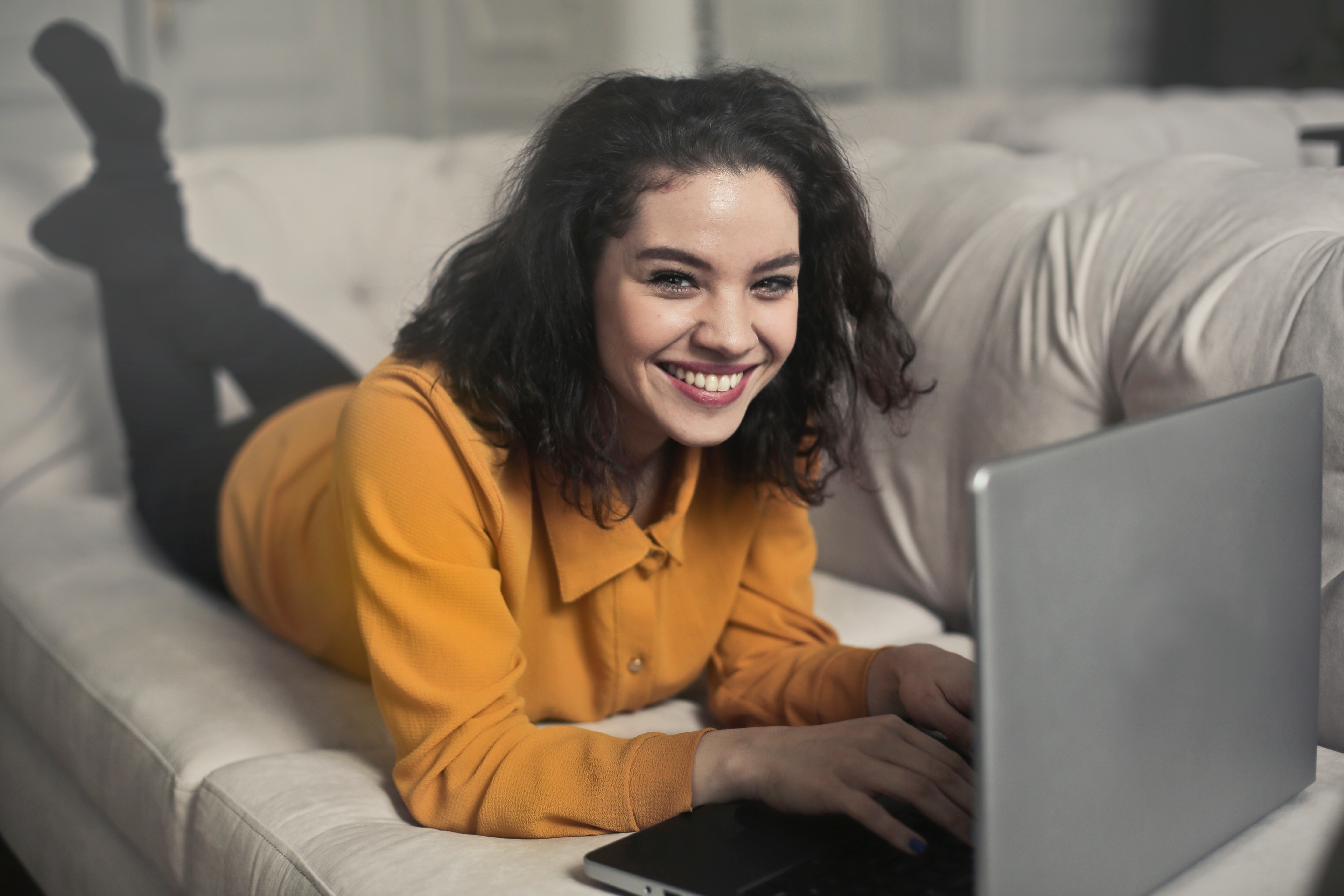 Woman Couch Laptop Happy