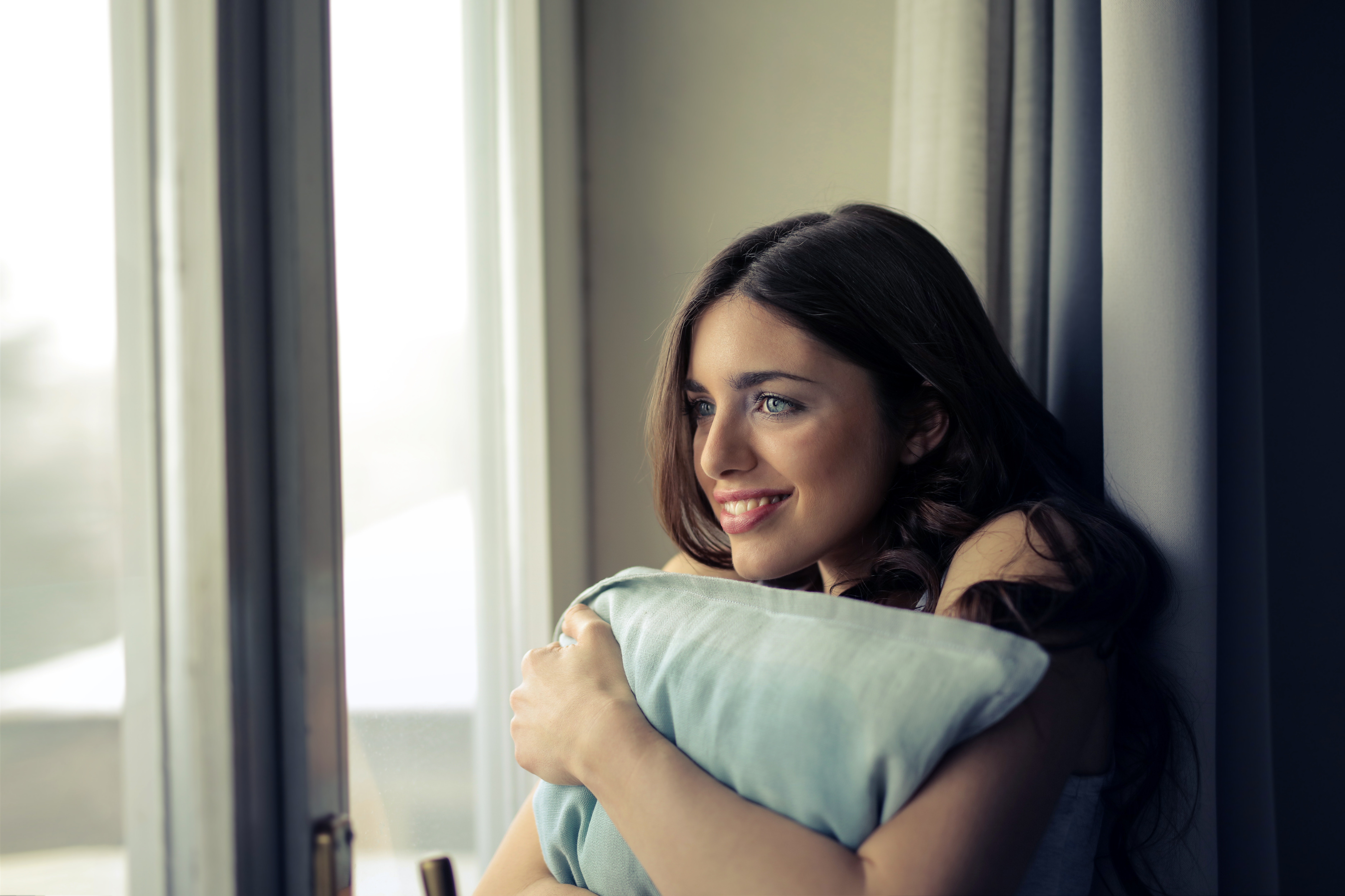 Woman Smiling Window