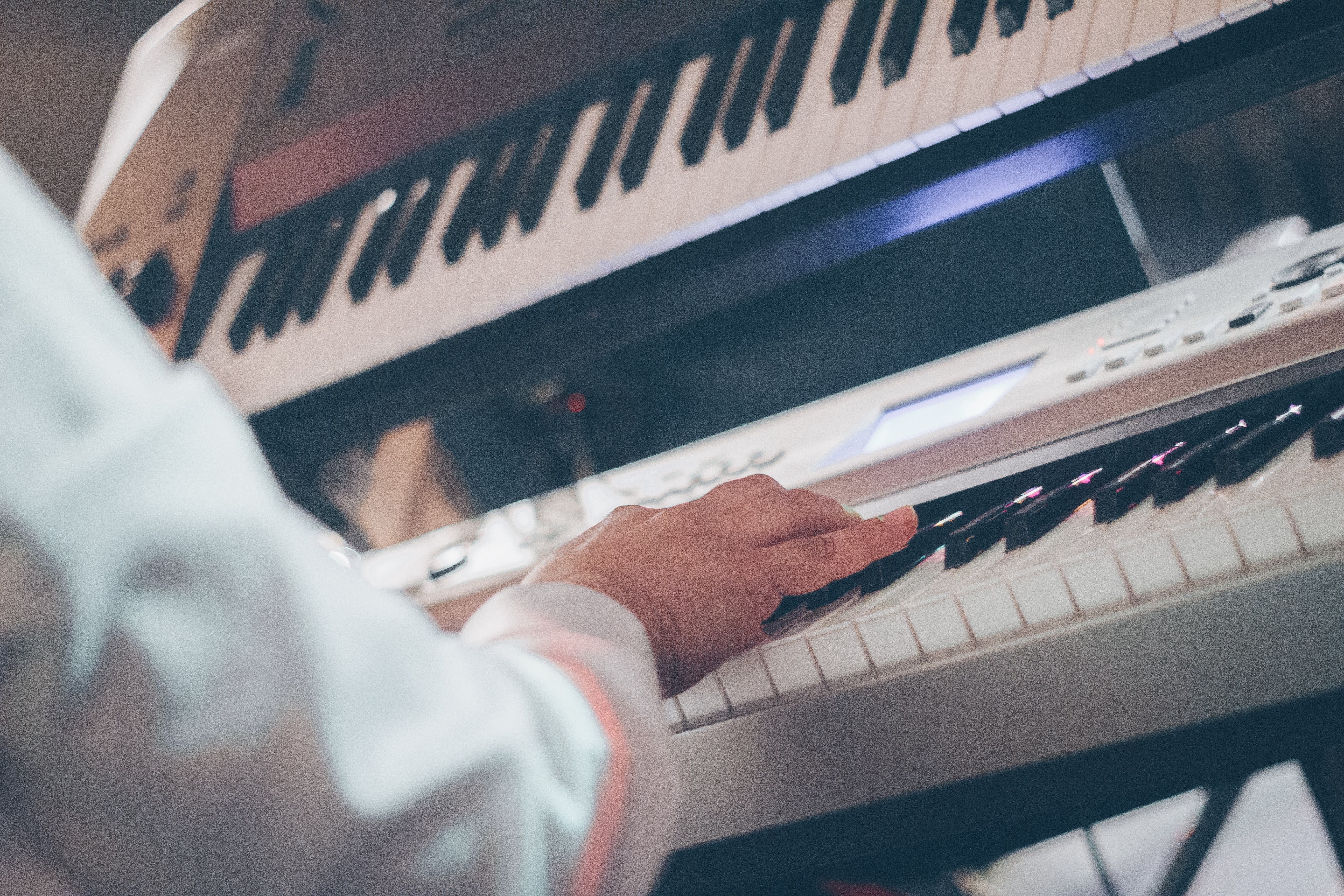 Man Playing Keyboard