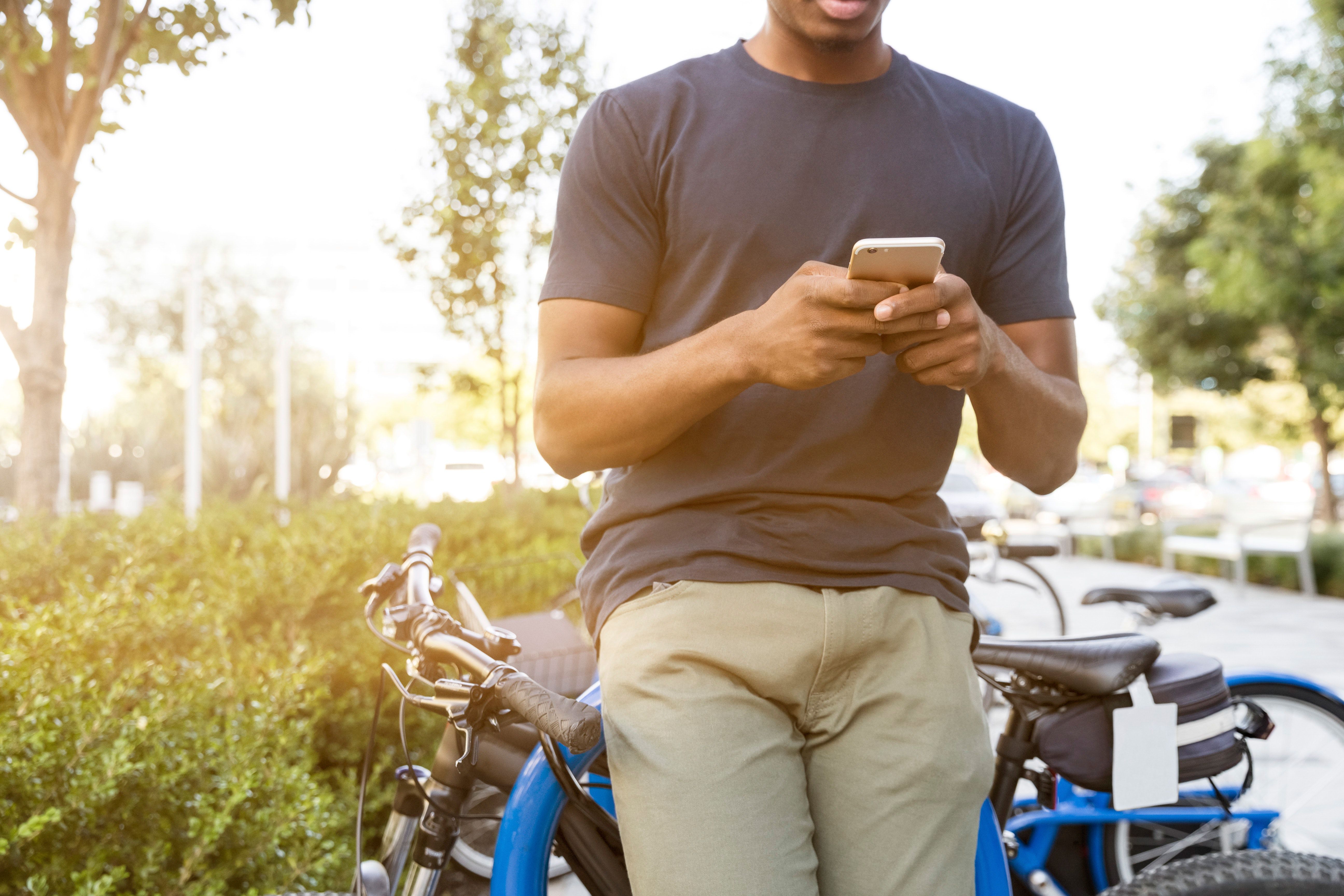 Man Bicycle Mobile Phone