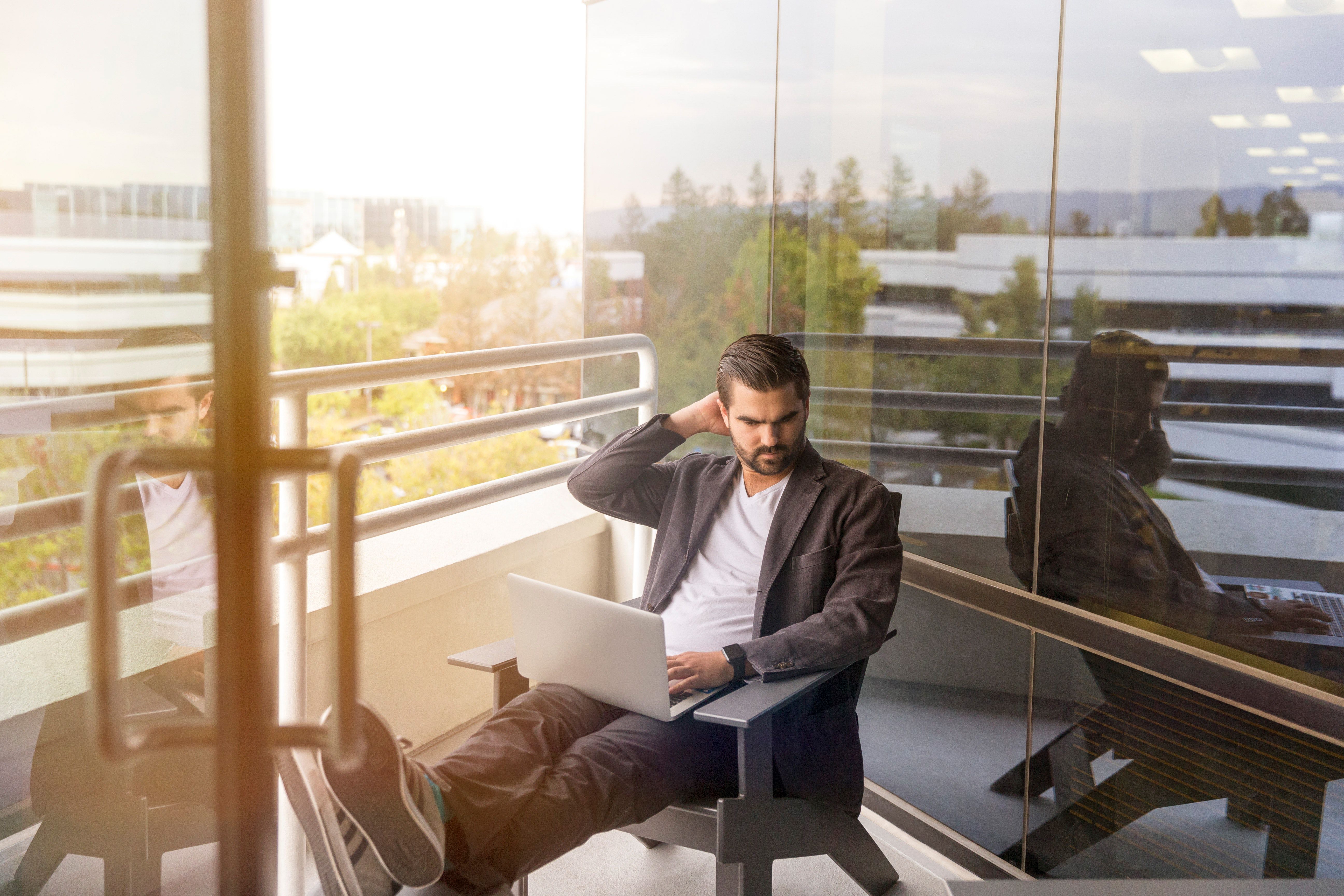 Man Sitting Outside Laptop Free Stock Photo Negativespace