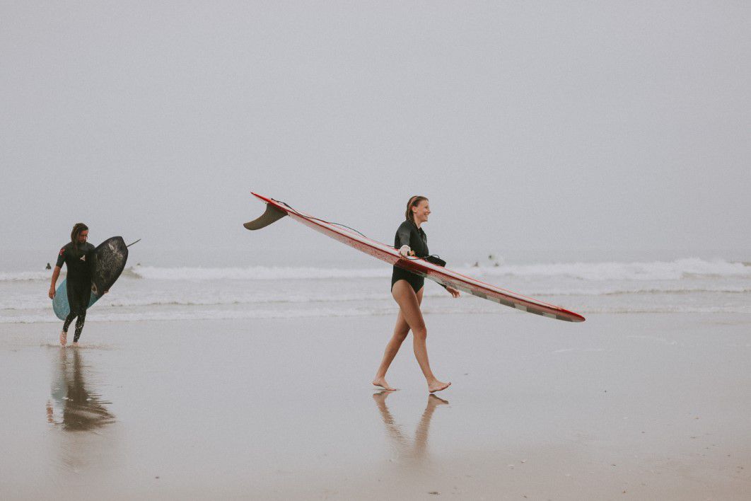 Woman Beach Surfing