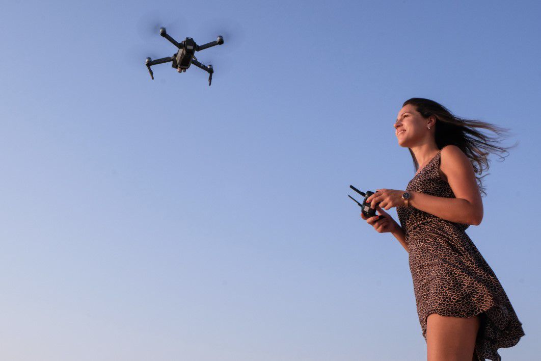 Woman Flying Drone