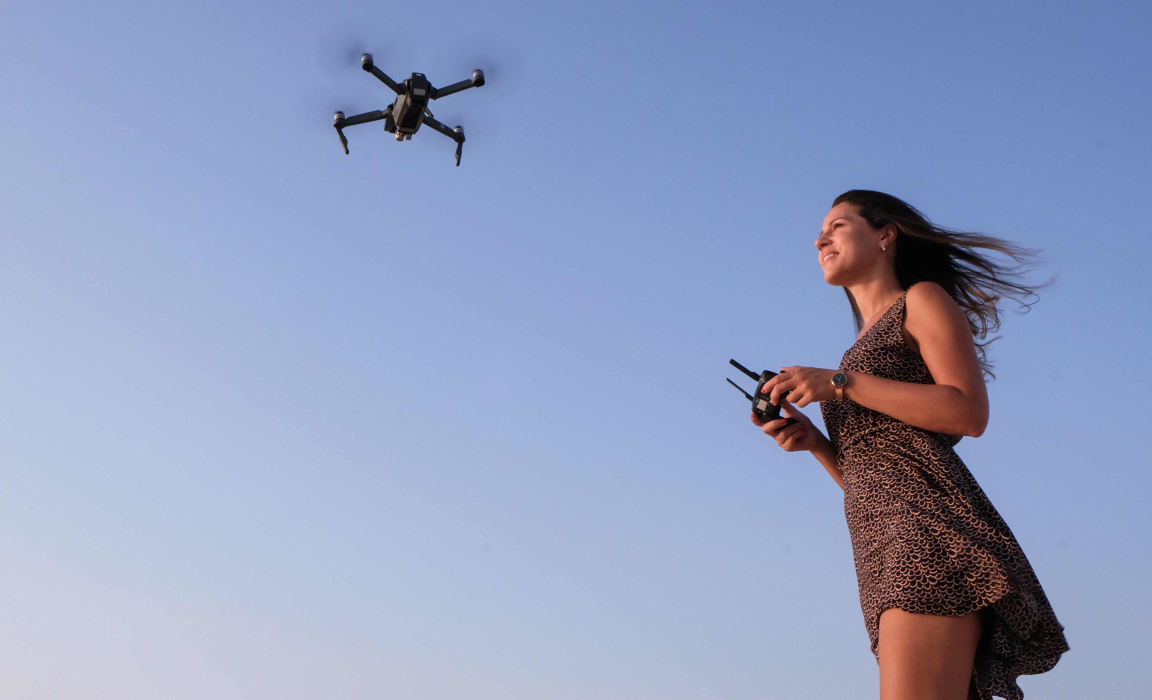 Woman Flying Drone