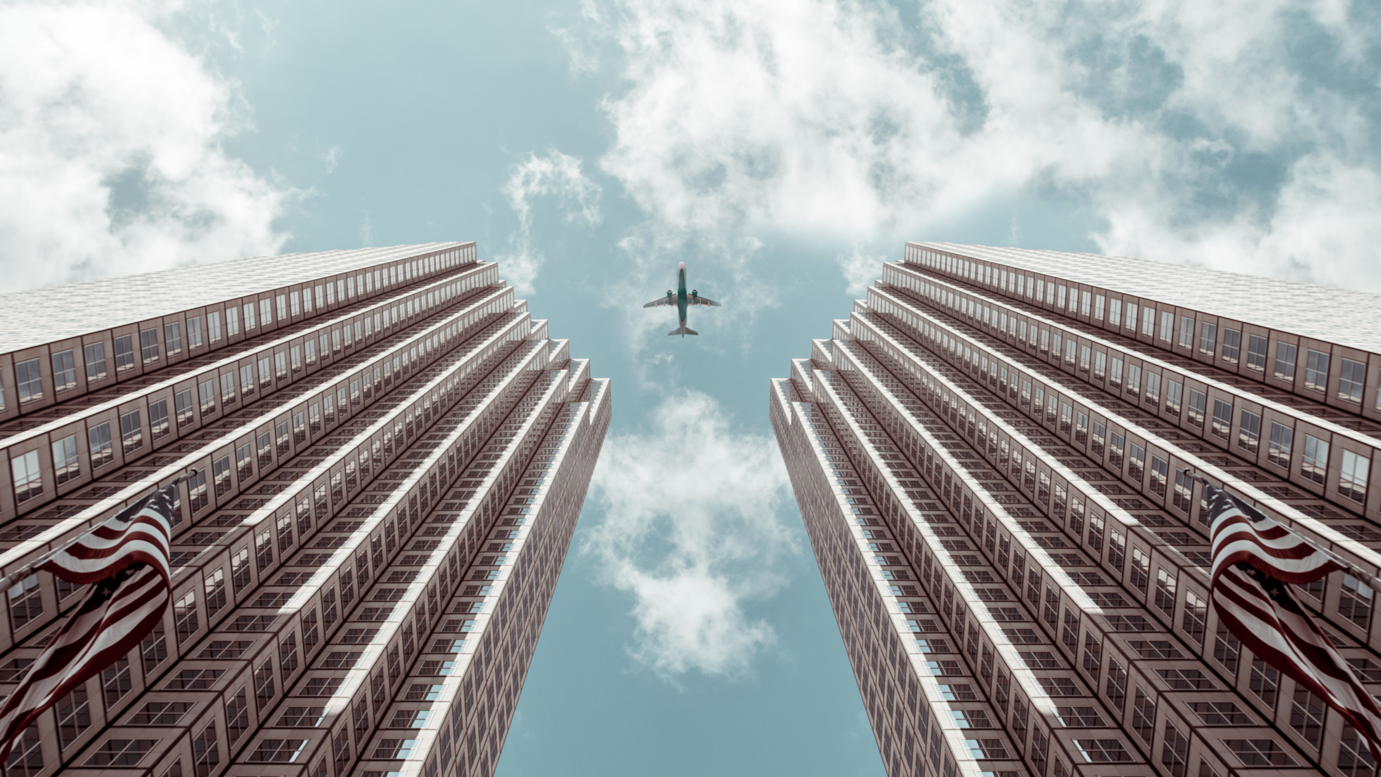 Airplane Between Buildings