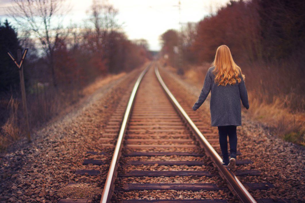 Girl Walking Railway Track