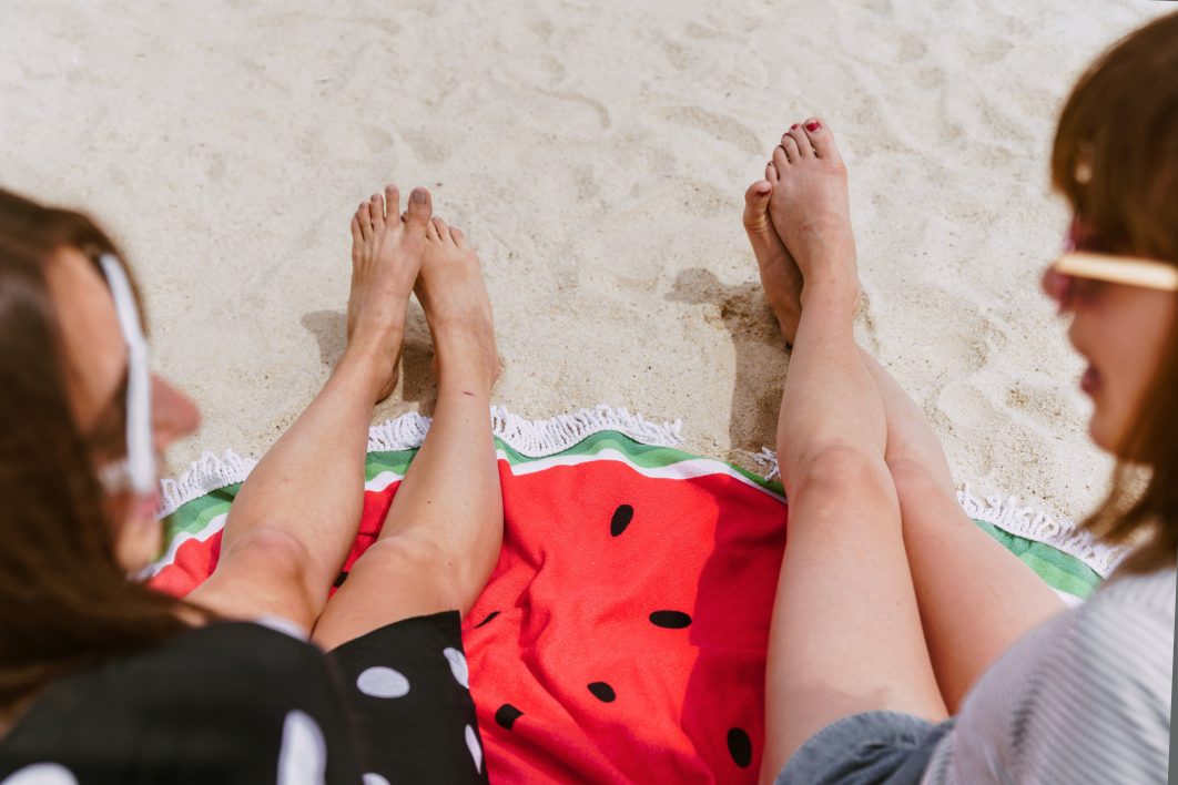 Friends Talking at the Beach