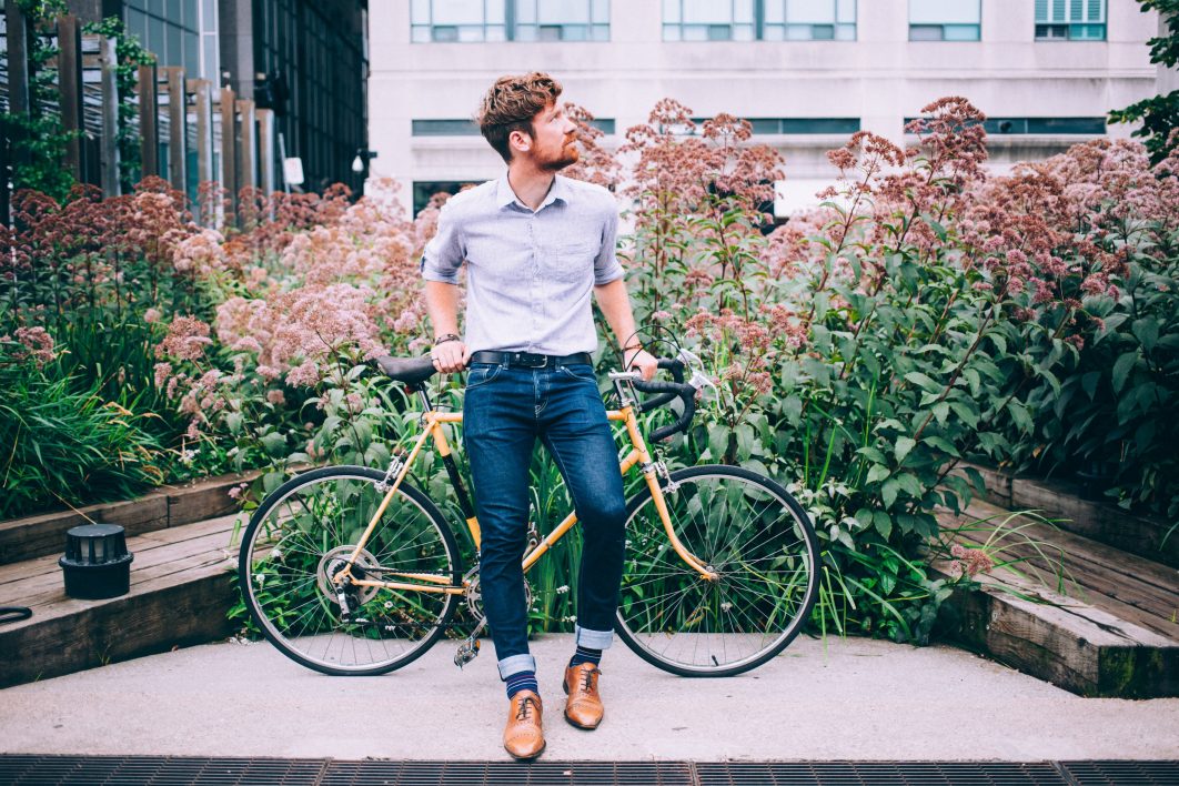 Man Leaning on Bicycle