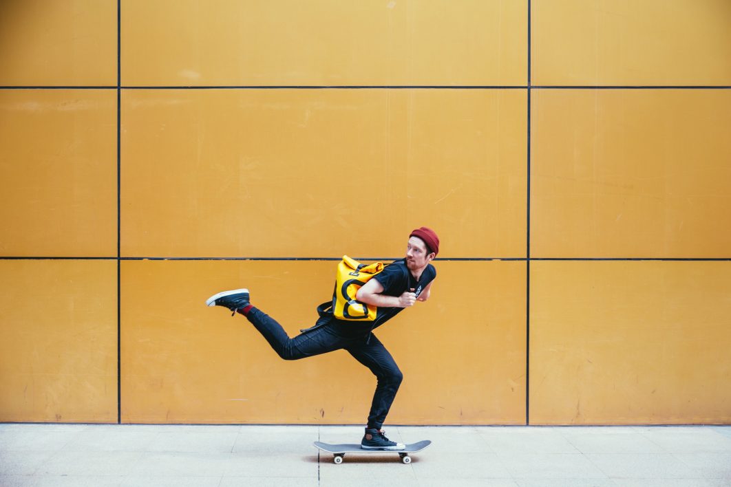 Skateboarder on Sidewalk