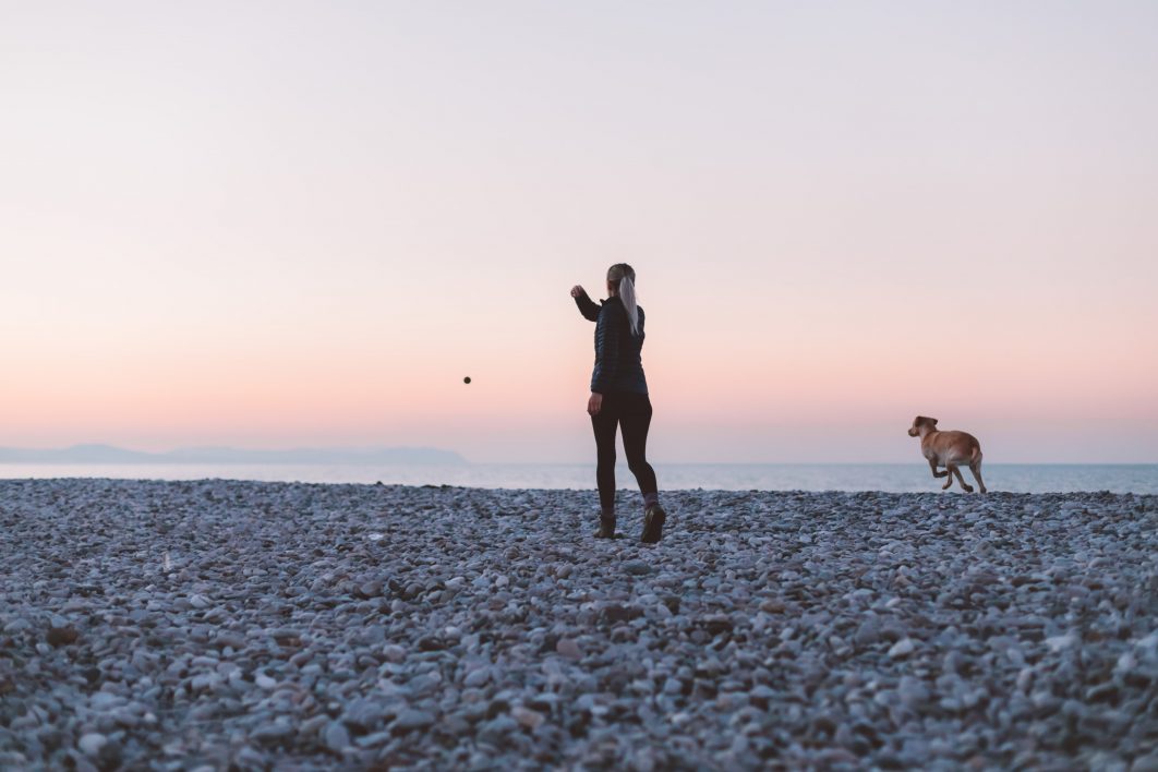 Woman walking on beach