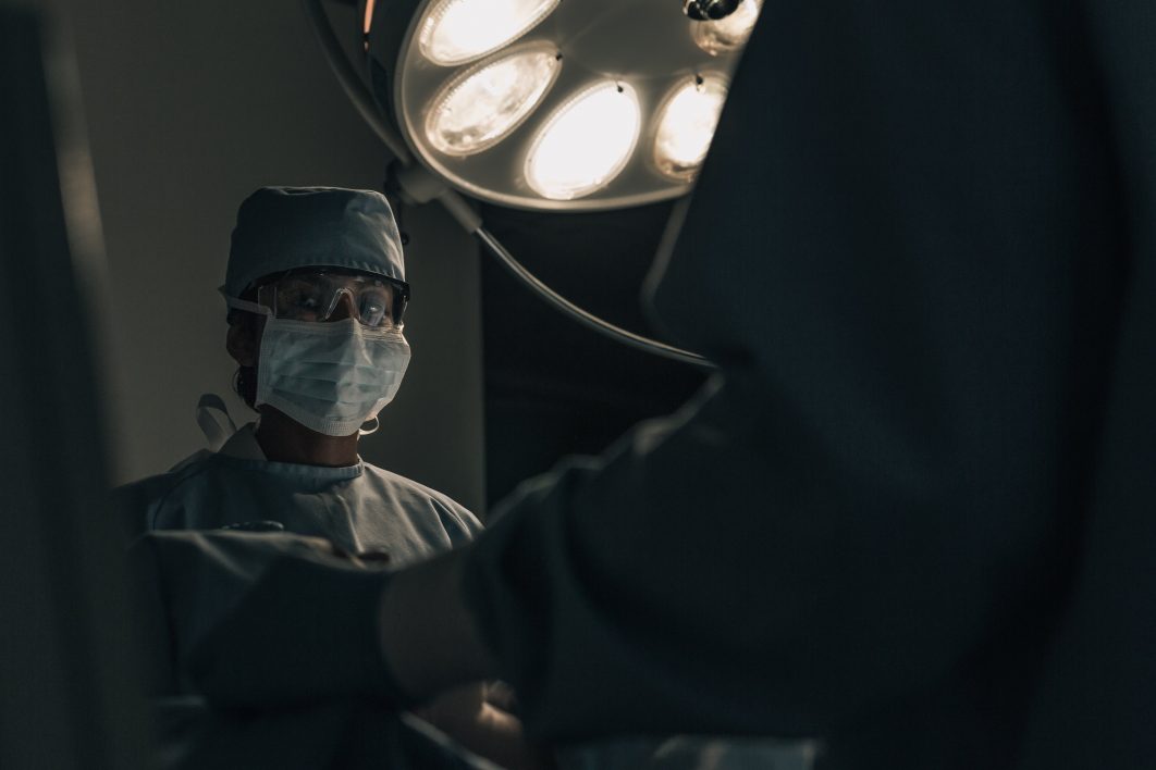 Surgeon in Scrubs Operating