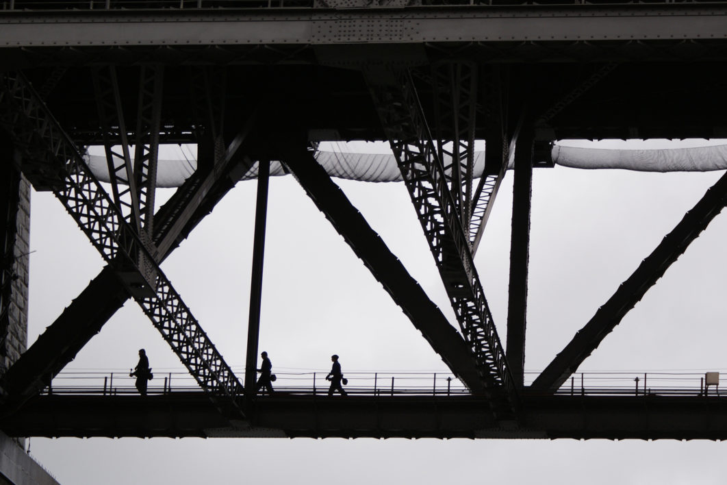 People Crossing Bridge