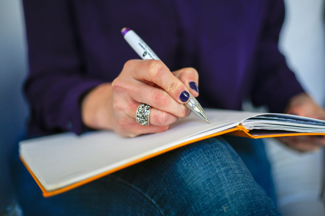 Woman Writing Notebook