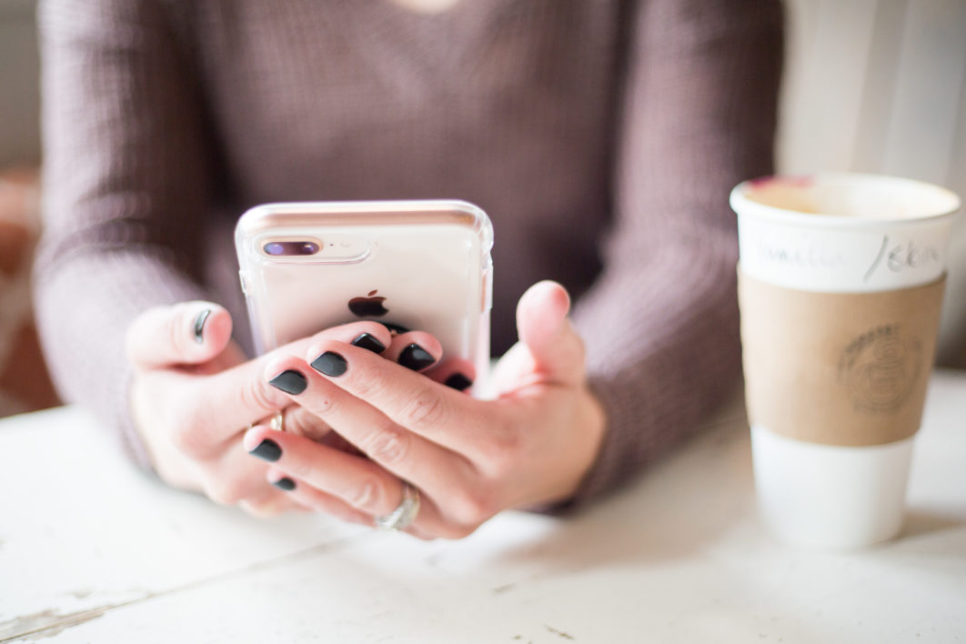 negative-space-hands-phone-nails-coffee-1062x708.jpg