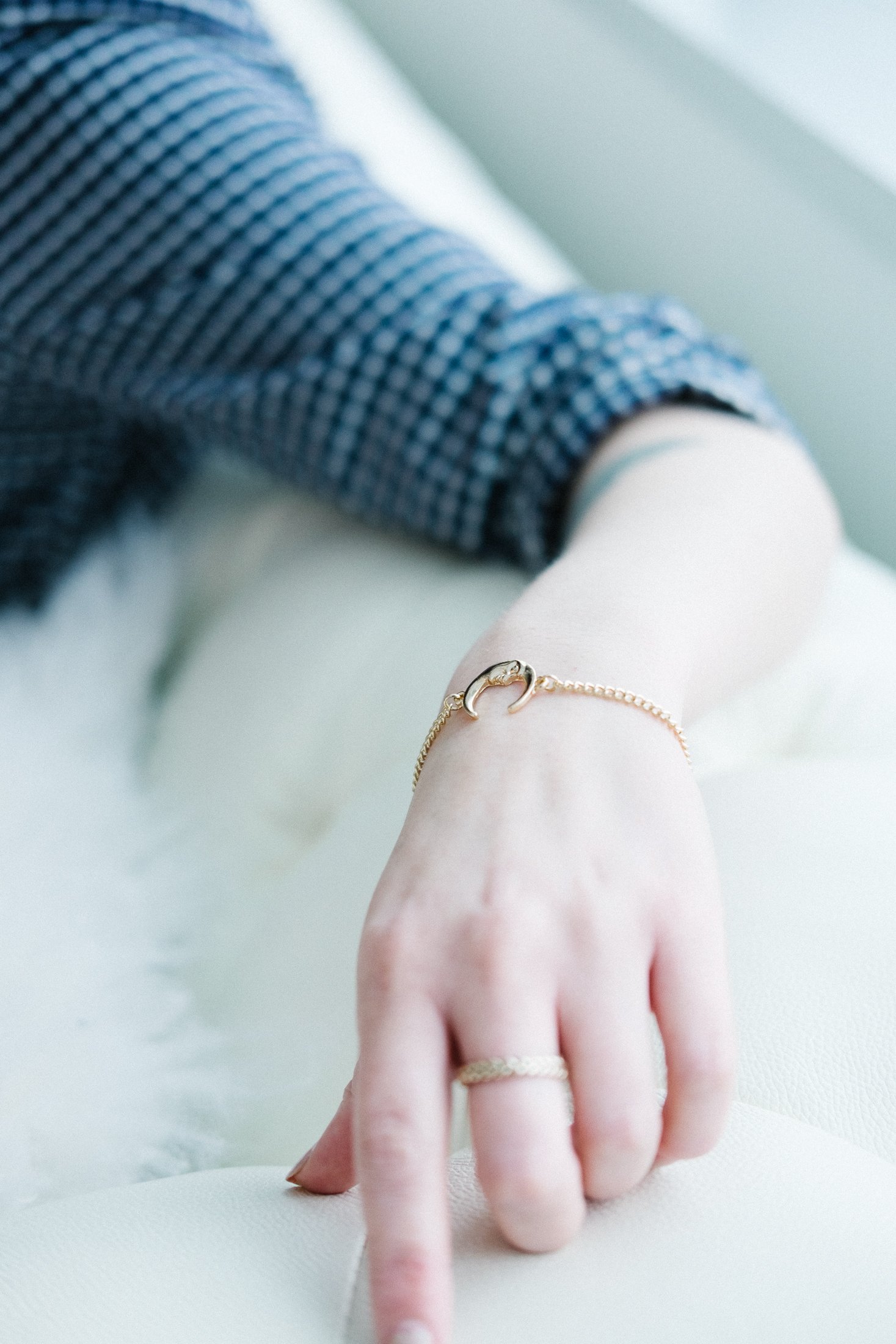 Hand with Gold and Silver Bracelets · Free Stock Photo