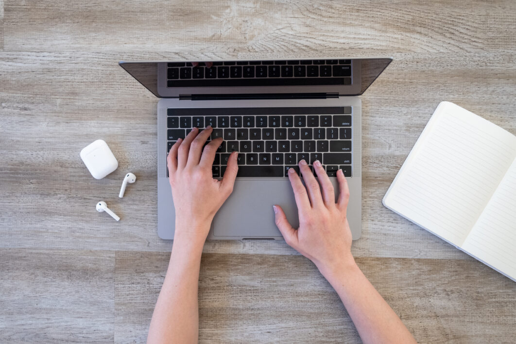 negative-space-laptop-hands-notebook-air