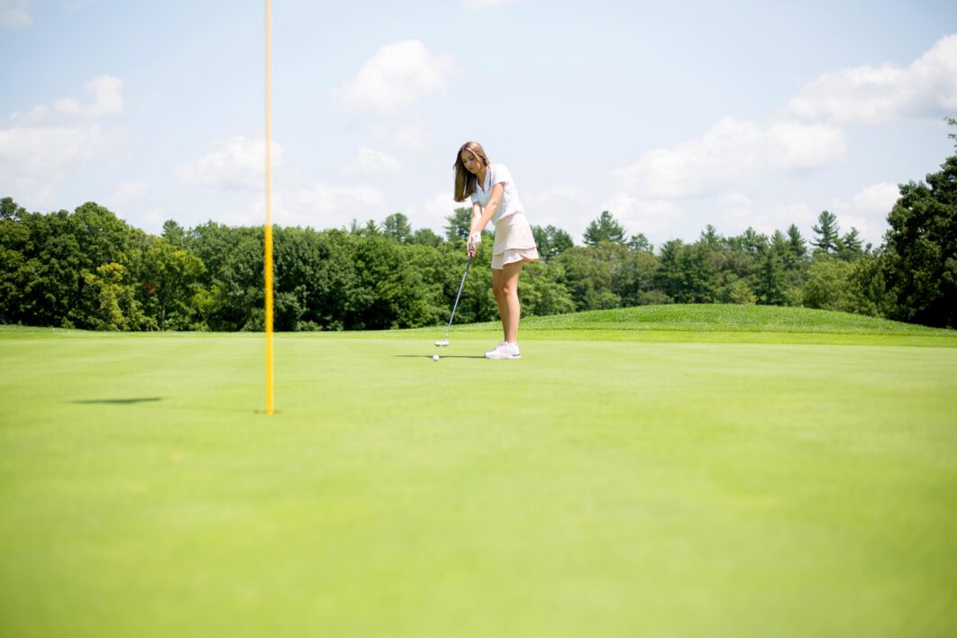 Woman Golfer Golfing