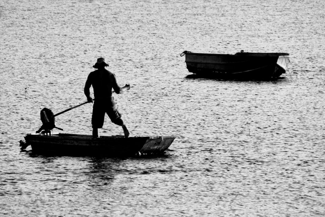 Fisherman Silhouette Boat